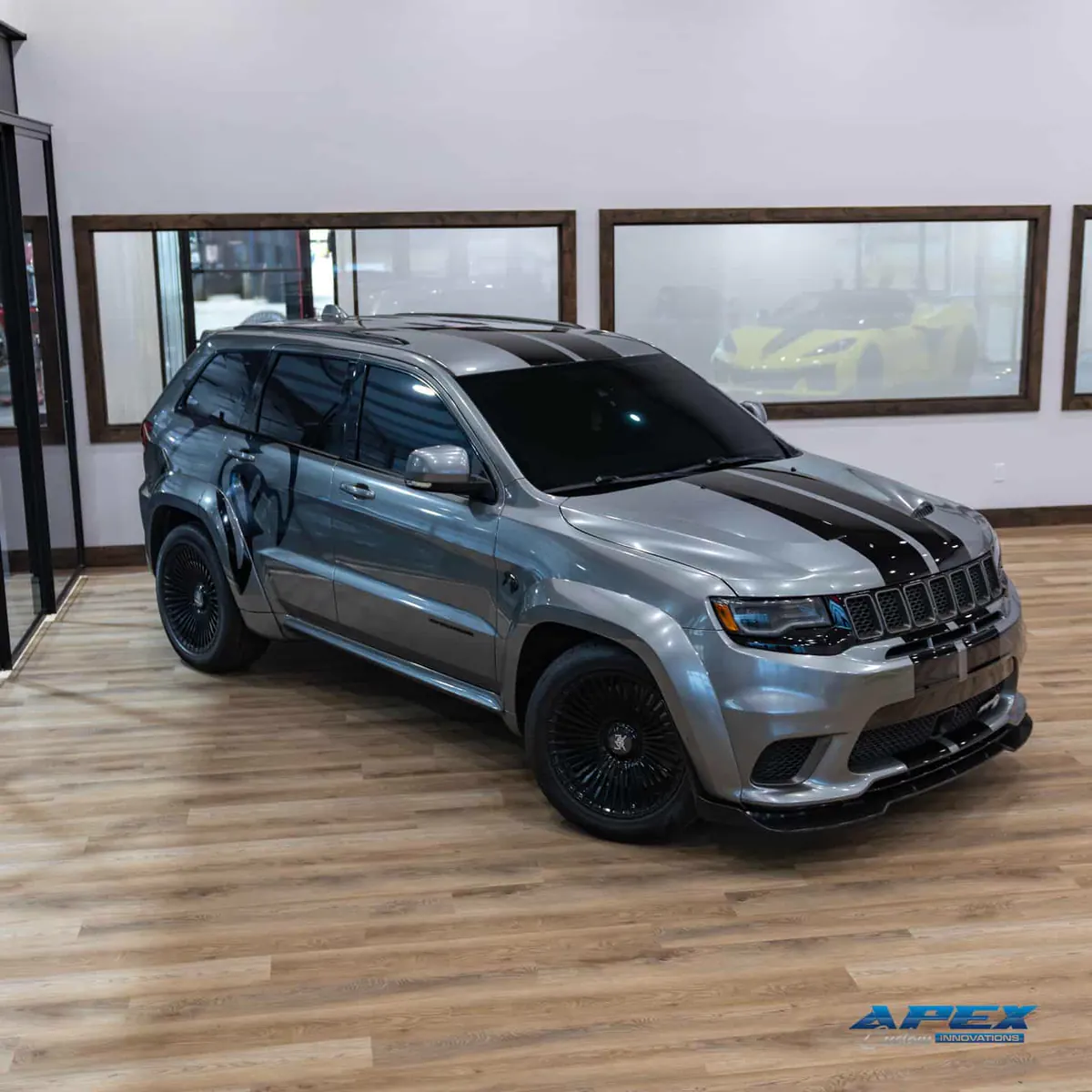 2021 Jeep Grand Cherokee Trackhawk in a silver wrap with wide body kit